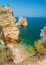 Scenic golden cliffs in Ponta da Piedade, Lagos, Algarve, Portugal.